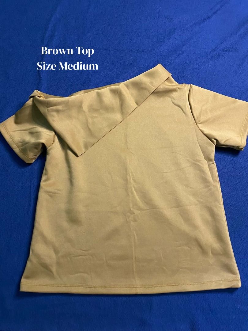 Brown Top Size Medium (Category: Blouses) located in Santa Cruz, Pampanga. Submitted by jncthriftshop (Listing ID 1468632145, Image 1). Description: Please note that this item is pre-loved and not brand new. It may have minor signs of use, such as small stains, loose threads, slight fading, or other minor imperfections. Please manage your expectations and check all photos carefully before purchasing. -Condition: Pre-loved / Secondhand -Minor flaw