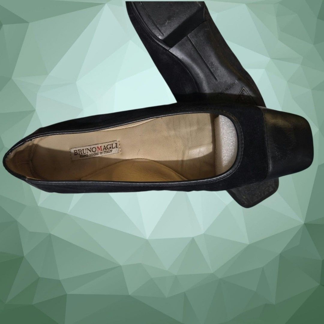 Bruno Magli Black Leather Square Toe Flats (Category: Flats & Sandals) located in Paranaque City. Submitted by calm_youngstore7 (Listing ID 1468593413, Image 2). Description: - Brand: Bruno Magli - Origin: Handmade in Italy - Material: Smooth leather cap toe with soft suede-like body and tan leather inner lining - Design: Square toe, low stacked heel, slip-on style - Condition: Soles show light wear with debossed logo pattern - Perfect for: Comfo