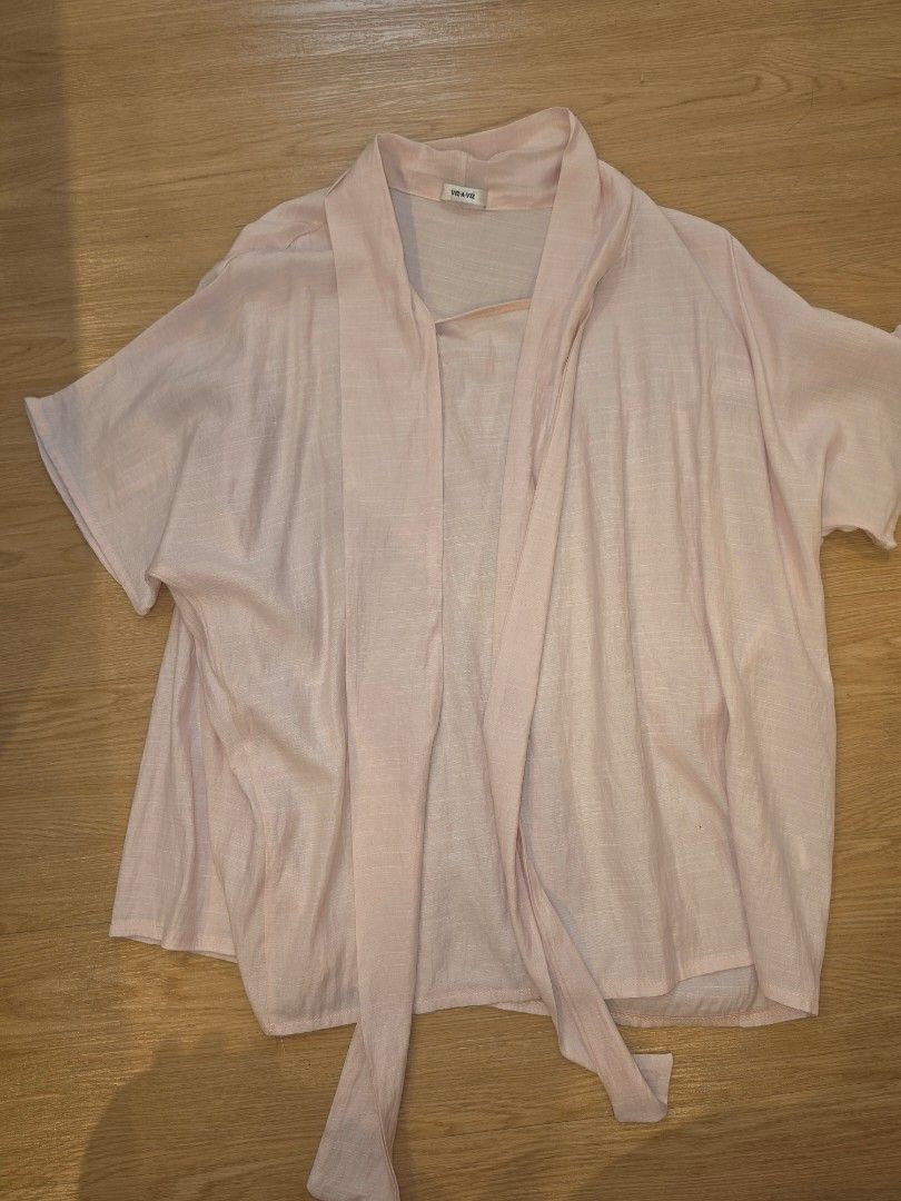 Bundle office Blouses (Category: Blouses) located in Valenzuela. Submitted by cessa009 (Listing ID 1468530662, Image 1). Description: - Brand: Viz-A-Viz - Color: Light pink - Design: Short sleeves with a chic tie-front - Fabric: Soft, slightly textured material - Condition: Clean, excellent overall - Environment: Smoke-free home - Styling Tip: Looks great with high-waisted pants or skirts.