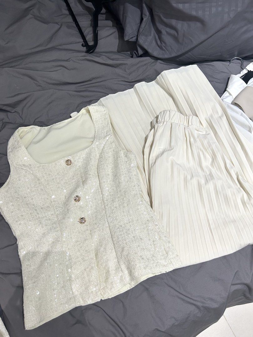 Bundle: Office outfit set (Off-white) (Category: Others Tops) located in Quezon City. Submitted by maekuuh (Listing ID 1468660963, Image 2). Description: Set 1: Top+Pleated Pants Off-White Sequin Single-Breasted Vest & Pleated Wide-Leg Pants 2 Pieces Set,Elegant Summer Party Sparkly Outfit,Glamorous Christmas New Year Set 2: Khaki Vest Khaki V-Neck Sleeveless Front Button Vest, Business Casual Formal Attire For Women.