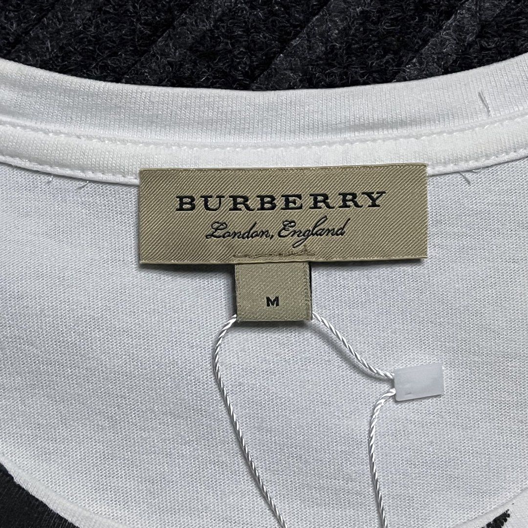 Burberry Grafitti Style Logo (Category: Shirts) located in Davao. Submitted by archived.status (Listing ID 1468580646, Image 3). Description: COLOR MAY VARY DUE TO LIGHTING‼️ Condition: 9.5/10 Color rate: 9.5/10, or better Issue: N/A Size Medium Width 19 Length 27.