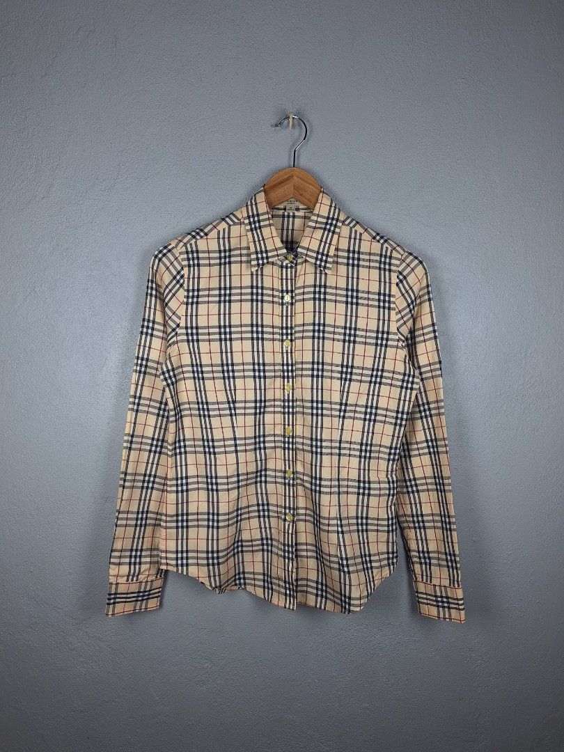 Burberry Womens Longsleeve (Category: Luxury Apparel) located in Sibulan. Submitted by studioxano (Listing ID 1468591441, Image 1). Description: Burberry Womens Longsleeve -P750 + SF Size M length 25.5 / Width 18 Excellent condi 9.5/10 color rate no issue Loc:Dumaguete city.
