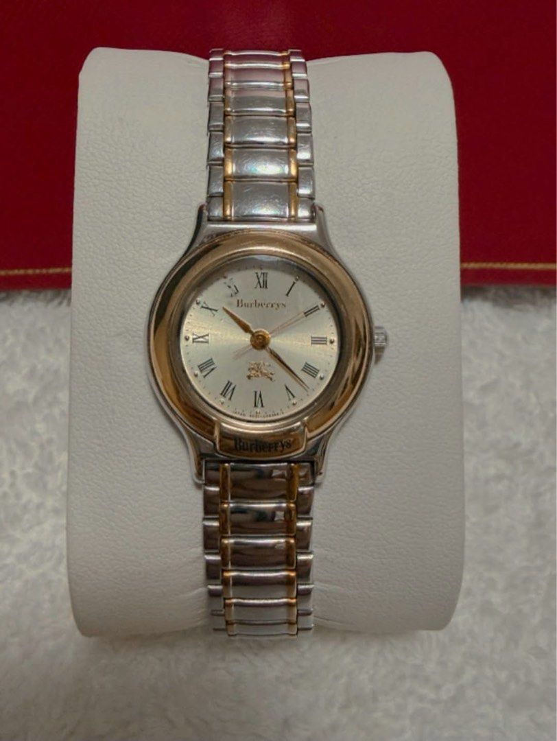 Burberrys Watch (Category: Luxury Watches) located in Quezon City. Submitted by liezl.marie (Listing ID 1468686500, Image 1). Description: Burb€rrys (two-tone gold and steel) quartz wristwatch, a white dial with Roman numeral hour markers and a gold-tone bezel. - In excellent condition -7.5 inches wrist size or smaller 5,500 Open for layaway. Disclaimer: We are not affiliated, associated, authorized, endorsed by or in any way officially connected