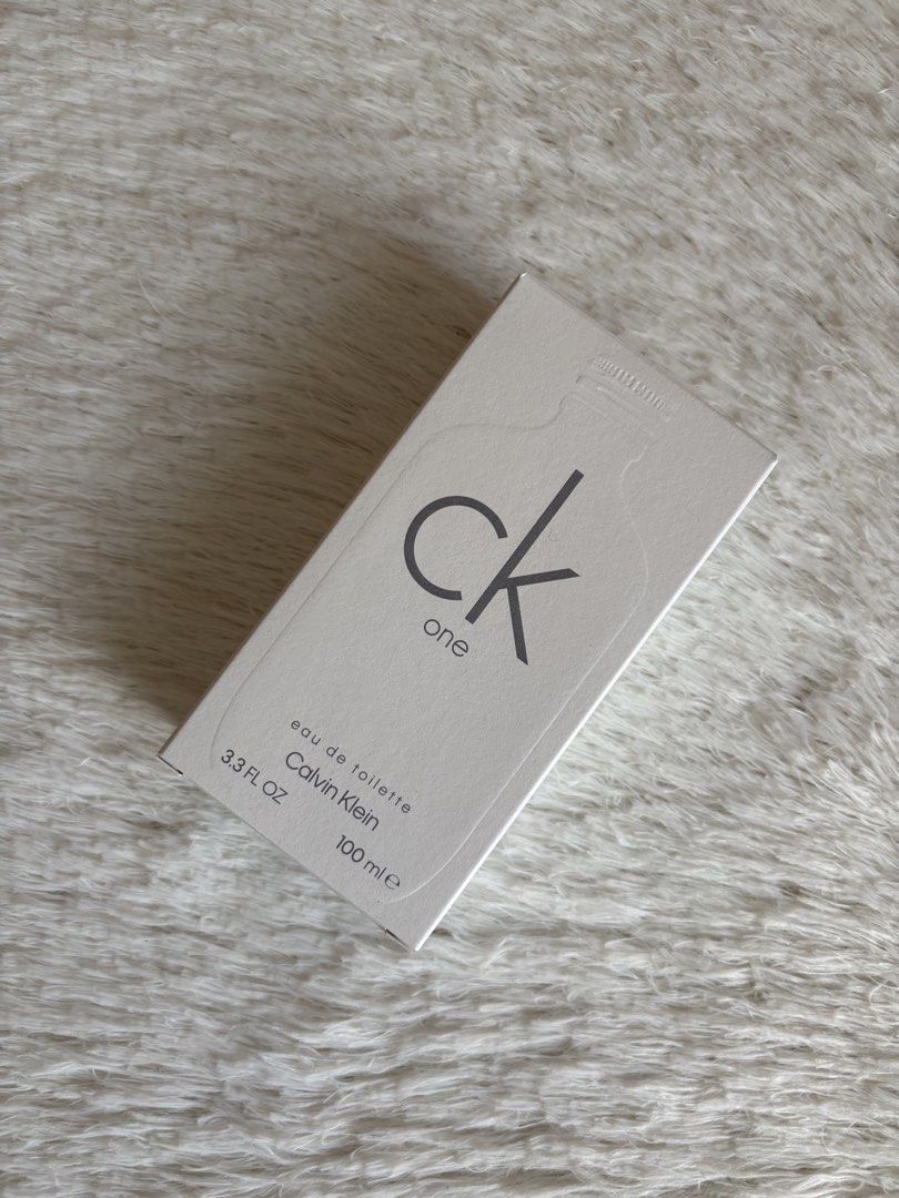 CALVIN KLEIN CK ONE EAU DE TOILETTE 100ML (Category: Fragrance & Deodorants) located in Imus. Submitted by dumpitlikeaqueen (Listing ID 1468511234, Image 2). Description: • Bought at LUXE Duty Free • With LUXE paper bag • Open for layaway • Instagram Shop: @dumpitlikeaqueen.