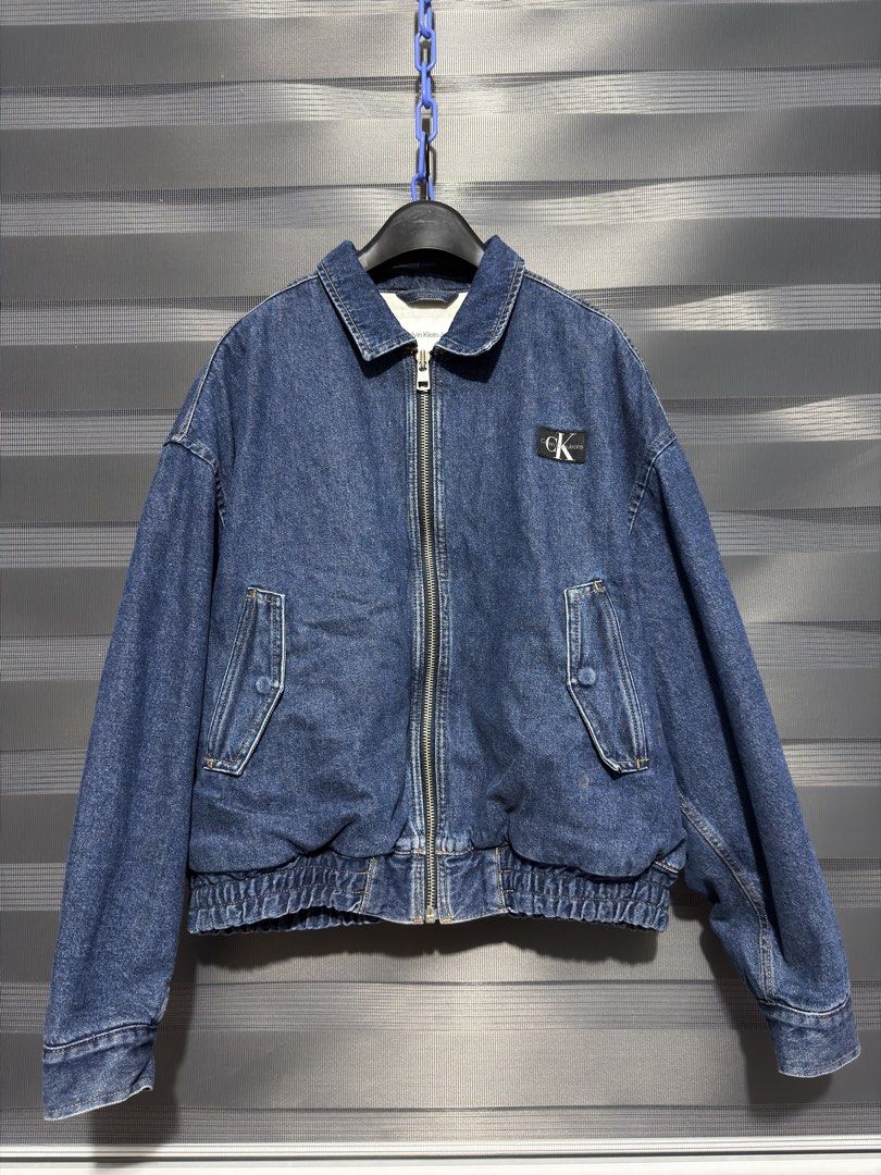 Calvin Klein Jeans Denim Bomber Jacket (Category: Coats, Jackets and Outerwear) located in Calumpit. Submitted by Essentiality (Listing ID 1468637873, Image 1). Description: Calvin Klein Jeans Denim Bomber Jacket 29x25 S on tag ₱2,500.