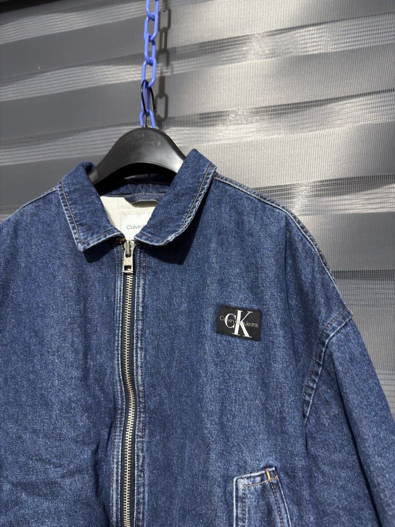 Calvin Klein Jeans Denim Bomber Jacket (Category: Coats, Jackets and Outerwear) located in Calumpit. Submitted by Essentiality (Listing ID 1468637873, Image 2). Description: Calvin Klein Jeans Denim Bomber Jacket 29x25 S on tag ₱2,500.