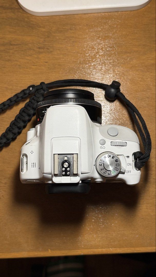 Canon 100d + 40mm pancake lens (Category: Cameras) located in Cabuyao City. Submitted by turrster (Listing ID 1468661865, Image 2). Description: Canon 100D with 40mm 1.8 STM pancake lens / 18MP Touch screen LCD 100% Good condition Inclusions: Canon 100D body Canon 40mm pancake lens Kenko 52mm UV filter 2 Batteries Canon original Charger Strap RFS: Nakatambak nalang bilhin niyo na please tapos na ako sa SLR phase ko 😭.