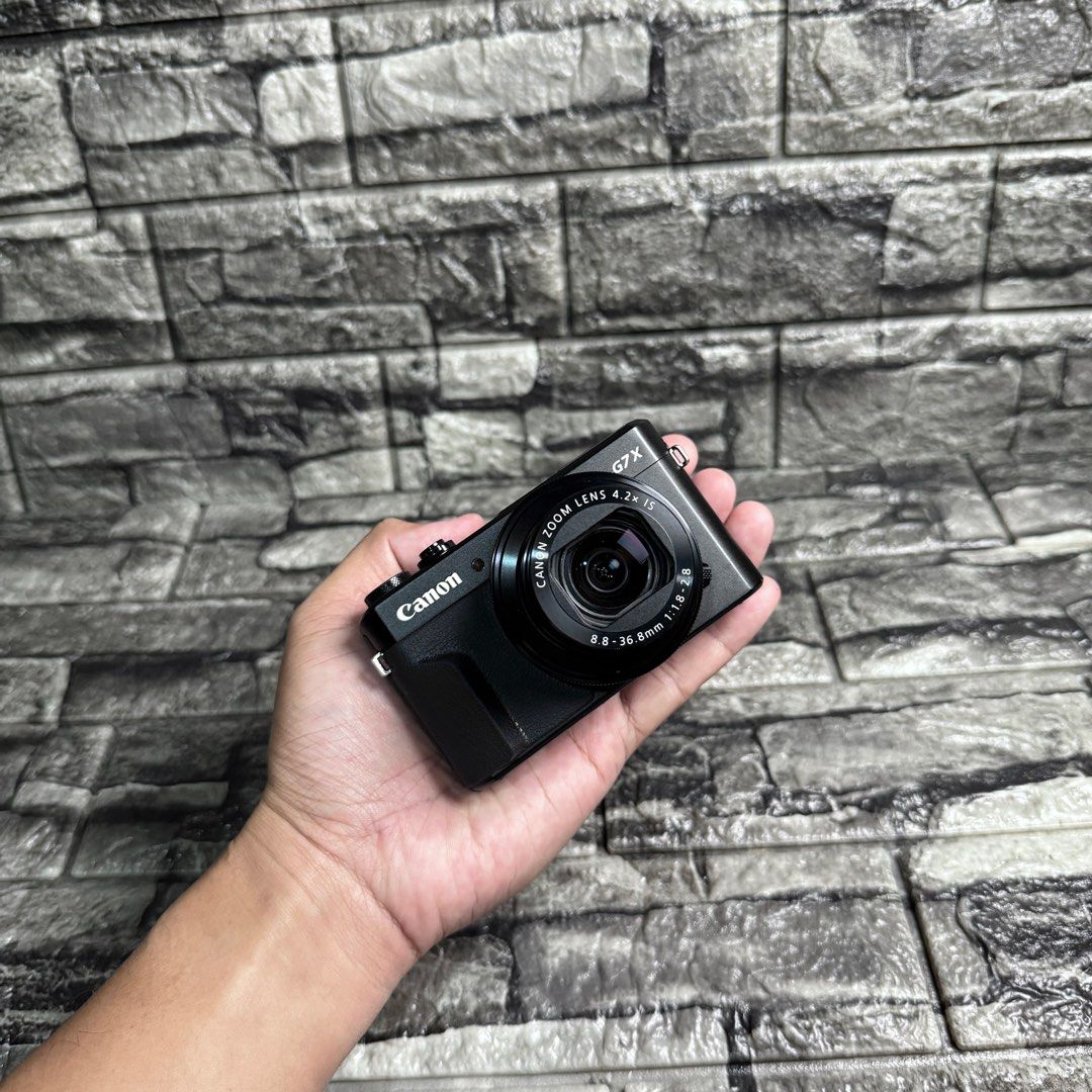 Canon G7x Mark II | Compact Camera (Category: Cameras) located in Caloocan City. Submitted by oltekgadgets (Listing ID 1468606183, Image 2). Description: Canon G7x Mark II | Compact Camera Key Features: *20.1MP 1” CMOS Sensor *DIGIC 7 Image Processor *4.2x Optical Zoom f/1.8-f/2.8 Lens *24-100mm (35mm Equivalent) *3.0” 1.04m-Dot Tilting LCD Touchscreen *Full HD 1080p Video Recording at 60 fps *Built-In Wi-Fi with NFC *ISO 12800, up to 8 fps Shoot
