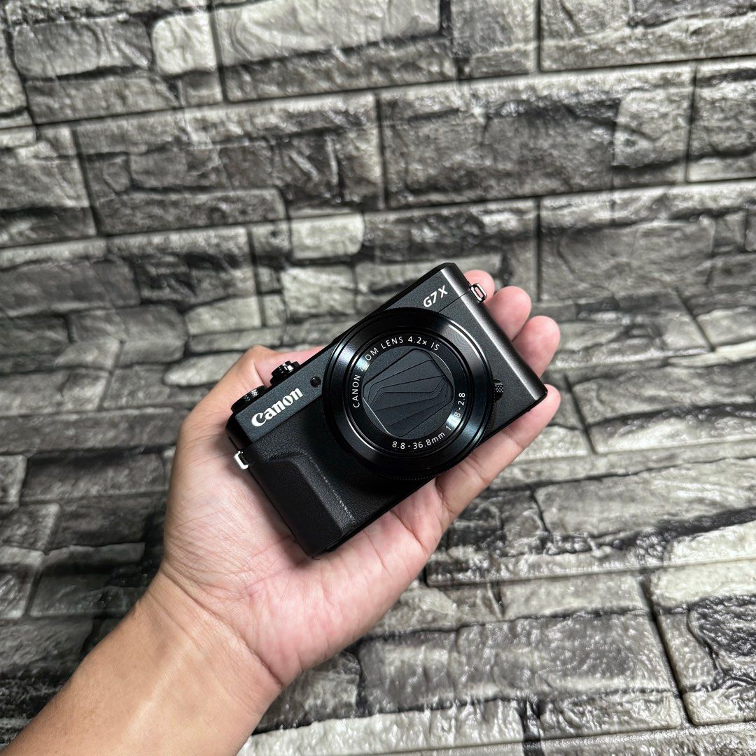Canon G7x Mark II | Compact Camera (Category: Cameras) located in Caloocan City. Submitted by oltekgadgets (Listing ID 1468606183, Image 1). Description: Canon G7x Mark II | Compact Camera Key Features: *20.1MP 1” CMOS Sensor *DIGIC 7 Image Processor *4.2x Optical Zoom f/1.8-f/2.8 Lens *24-100mm (35mm Equivalent) *3.0” 1.04m-Dot Tilting LCD Touchscreen *Full HD 1080p Video Recording at 60 fps *Built-In Wi-Fi with NFC *ISO 12800, up to 8 fps Shoot