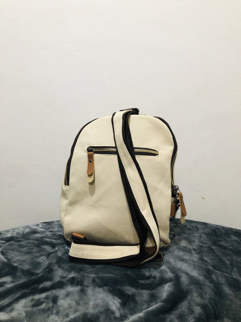 CANVAS DUMPLING BODY BAG (Category: Cross-body Bags) located in Imus. Submitted by dhouseoftotes (Listing ID 1468629367, Image 3). Description: 📐 MEASUREMENTS‼️ H - 14 inches W - 9 inches FROM JAPAN! IDEAL FOR EVERYDAY USE 1-OPEN POCKET INSIDE 1-ZIPPER POCKET (BACK) NEED WASH DISCLAIMER!! I am not affiliated, associated, authorised, endorsed by, or in any way officially connected with any of the brands, companies, or trademarks mentioned on this