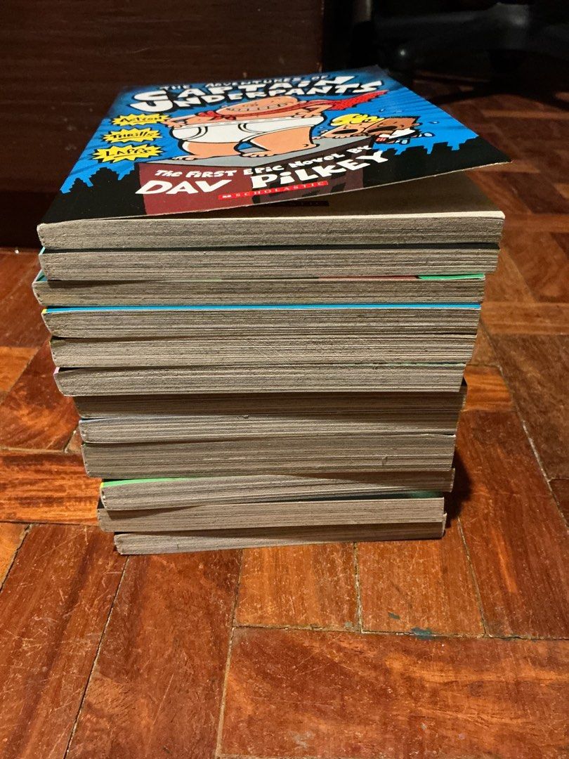 Captain Underpants Books 1-12 (Category: Children's Books) located in Muntinlupa City. Submitted by antonrizz (Listing ID 1468606830, Image 2). Description: - Complete 12-book Captain Underpants collection by Dav Pilkey - Great reading material and fun adventure stories for kids - All book spines are fully intact - Covers show normal shelf wear on edges and pages - Sold as a complete bundle set.
