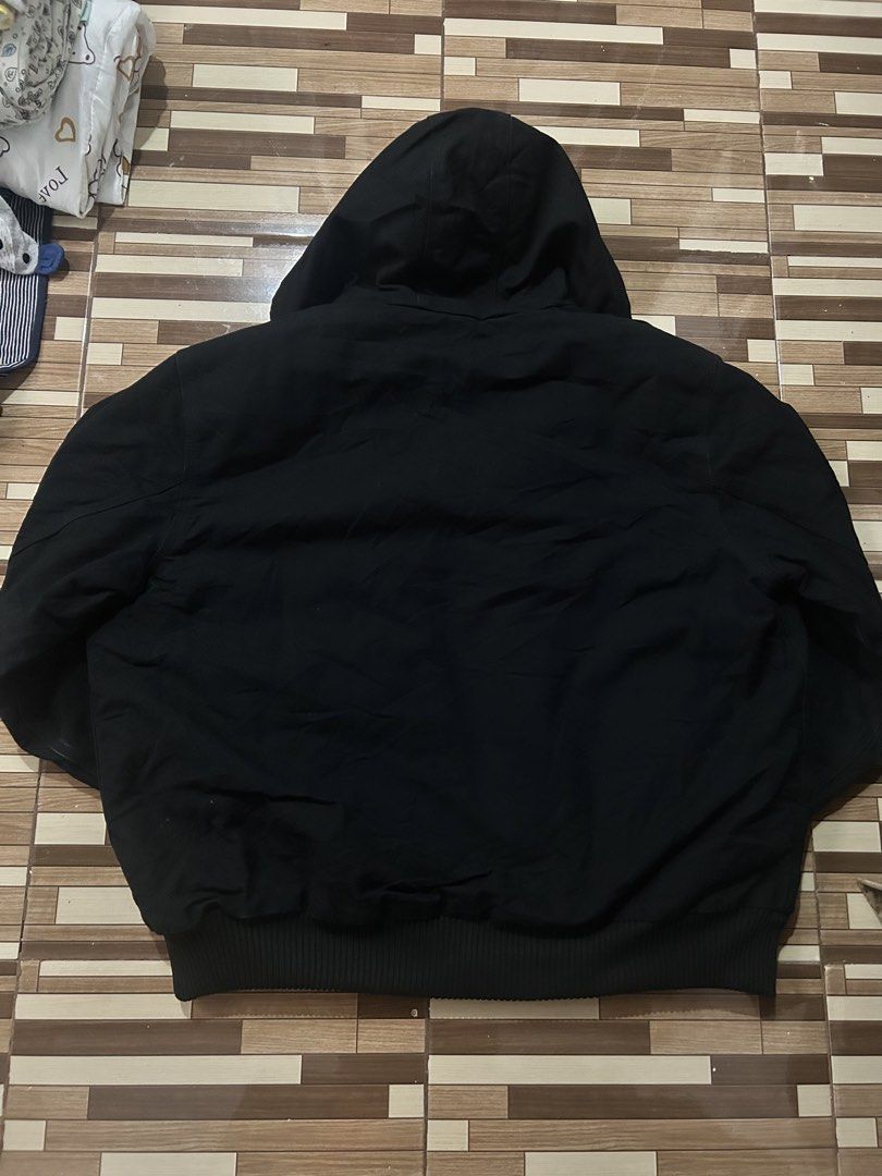 Carhartt active jacket (Category: Coats, Jackets and Outerwear) located in Caloocan City. Submitted by wadxxx (Listing ID 1468594142, Image 2). Description: - Brand: Carhartt - Color: Black - Size: XL - Material: Heavy-duty cotton duck with warm quilted lining - Origin: Made in USA Pm for details Unli vc sa item Unli vouch.