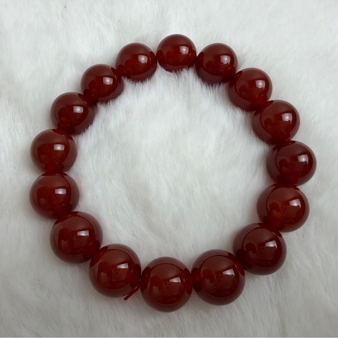 Carnelian 12mm Gemstone Crystal Bracelet (Category: Bracelets) located in Quezon City. Submitted by turtleandfishes (Listing ID 1468527006, Image 1). Description: - Material: Genuine carnelian beads - Design: Round polished stones in a rich dark cherry shade with natural variations - Fit: Simple and secure stretch cord for easy wear - Style: Minimalist and versatile - Occasion: Perfect for daily use, casual wear, or traditional outfits.