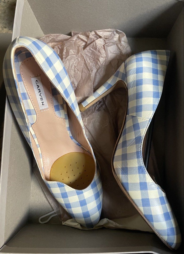 Carven Heels (Category: Sneakers & Footwear) located in Dumaguete. Submitted by jaymharr (Listing ID 1468510046, Image 1). Description: These Carven light blue and cream gingham pumps feature a pointed toe and a sleek stiletto heel. Made from printed leather with a classic checkered pattern, they bring a polished, retro-inspired aesthetic to dressed-up looks or elevated denim outfits..