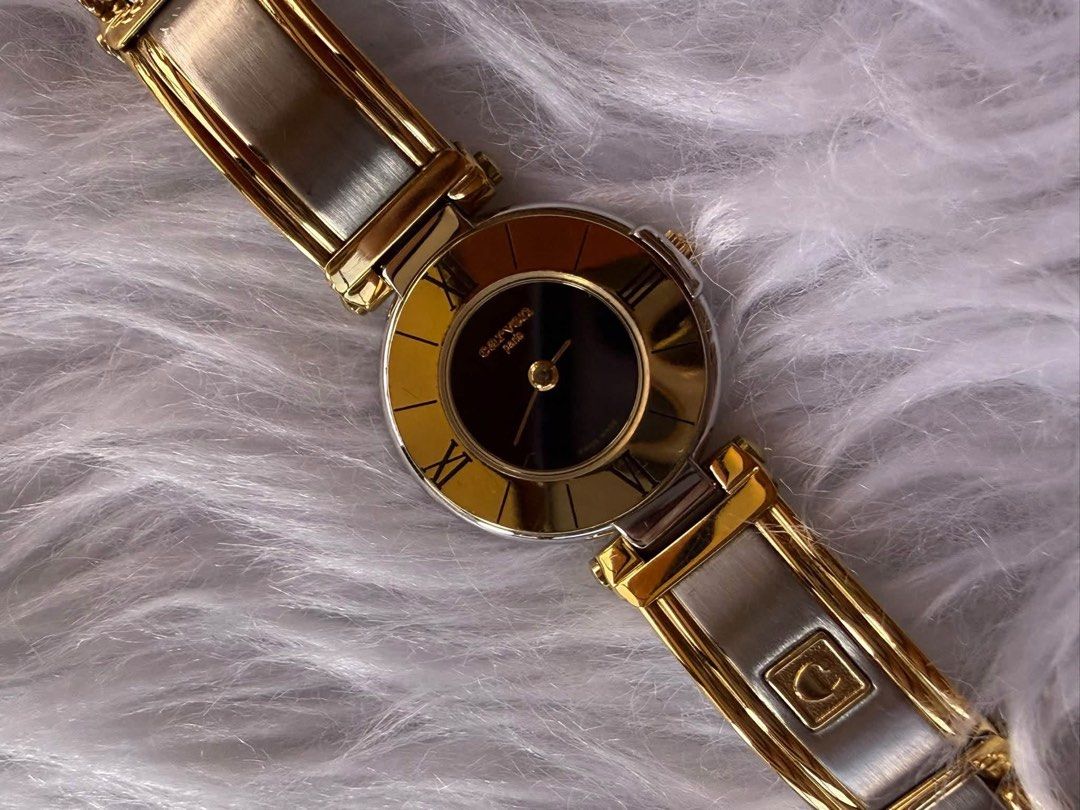Carven Watch (Category: Men's Watches) located in Quezon City. Submitted by liezl.marie (Listing ID 1468686752, Image 3). Description: A Carv€n Paris two-tone (gold and silver) quartz women’s vintage watch with a black dial, Roman numerals, and a distinctive bangle-style bracelet. - In excellent condition - Complete links 5500 Open for layaway..