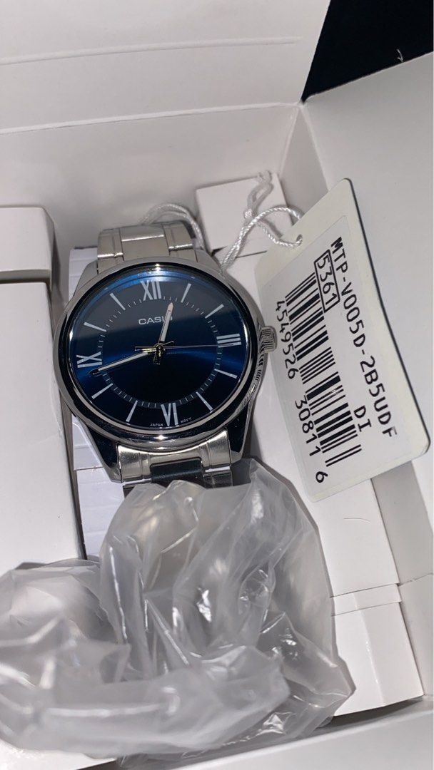 CASIO MTP-V005D-2B5UDF Men's Watch (Category: Luxury Watches) located in Manila. Submitted by sharlynnec61693 (Listing ID 1468529195, Image 1). Description: Condition: Brand New Color: Silver with Blue Dial Strap: Stainless Steel Display: Analog Classic and elegant design Price: ₱1,200.