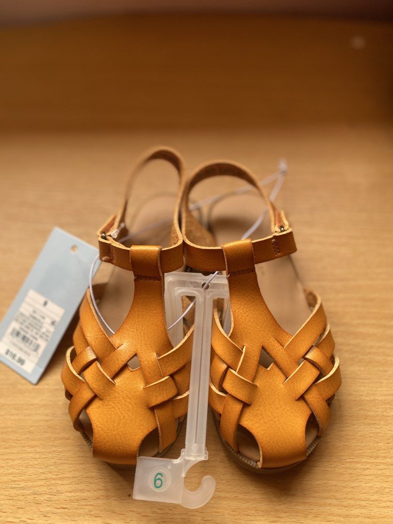 Cat & Jack Cognac Ella Sandals Size 9 (Category: Babies & Kids Fashion) located in Batangas. Submitted by lux_kimmy (Listing ID 1468587090, Image 1). Description: - Brand: Cat & Jack - Size: 9/ 15.5cm - Color: Cognac - Condition: Brand new with tags (BNWT) - Original Price: $16.99 - Design: Woven front strap with adjustable buckle ankle closure - Sole: Rubber with textured grip for safety - Perfect for everyday kid's wear and special occasions.