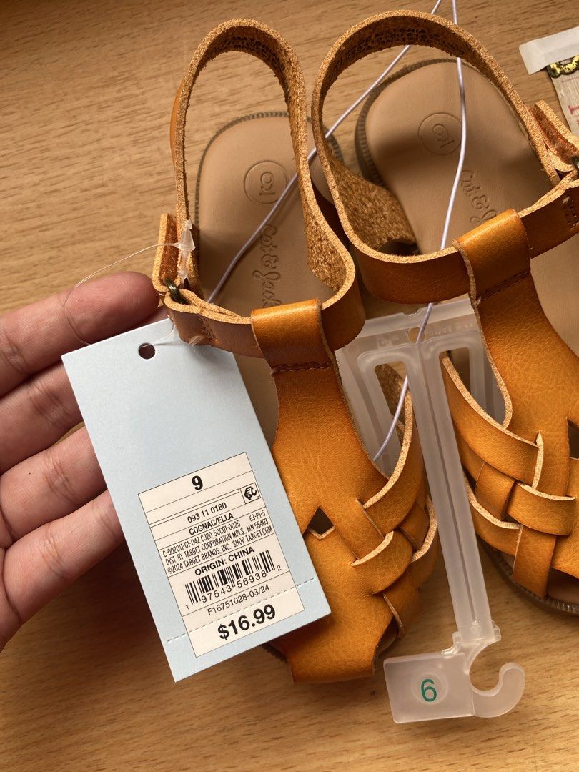 Cat & Jack Cognac Ella Sandals Size 9 (Category: Babies & Kids Fashion) located in Batangas. Submitted by lux_kimmy (Listing ID 1468587090, Image 2). Description: - Brand: Cat & Jack - Size: 9/ 15.5cm - Color: Cognac - Condition: Brand new with tags (BNWT) - Original Price: $16.99 - Design: Woven front strap with adjustable buckle ankle closure - Sole: Rubber with textured grip for safety - Perfect for everyday kid's wear and special occasions.