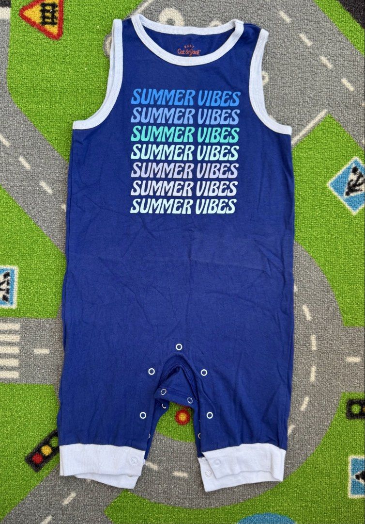 Cat & Jack Sleeveless Romper Onesie (Category: Babies & Kids Fashion) located in Rizal. Submitted by preloovved (Listing ID 1468603111, Image 1). Description: Super cute Cat & Jack blue sleeveless baby romper with colorful summer text, white trim, and bottom snaps for easy diaper changes. Made of soft, breathable cotton, perfect for warm days. Preloved, 24mos, pogi nito Meet-up only in GB1 San Mateo, Rizal Shipping fee c/o buyer. Tres Marias or J
