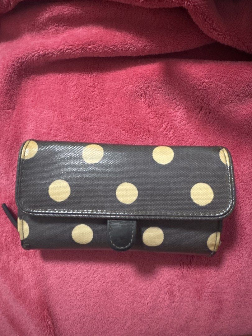Cath Kidston Grey Polka Dot Long Wallet (Category: Wallets & Card holders) located in Manila. Submitted by baristadrinkluvr (Listing ID 1468688492, Image 1). Description: - Authentic Cath Kidston long wallet - Chic grey exterior with cream polka dots - Secure front flap with snap closure - Interior includes multiple card slots and an ID window pocket - Durable fabric lining with clean stitching throughout - Features the classic London branding ta