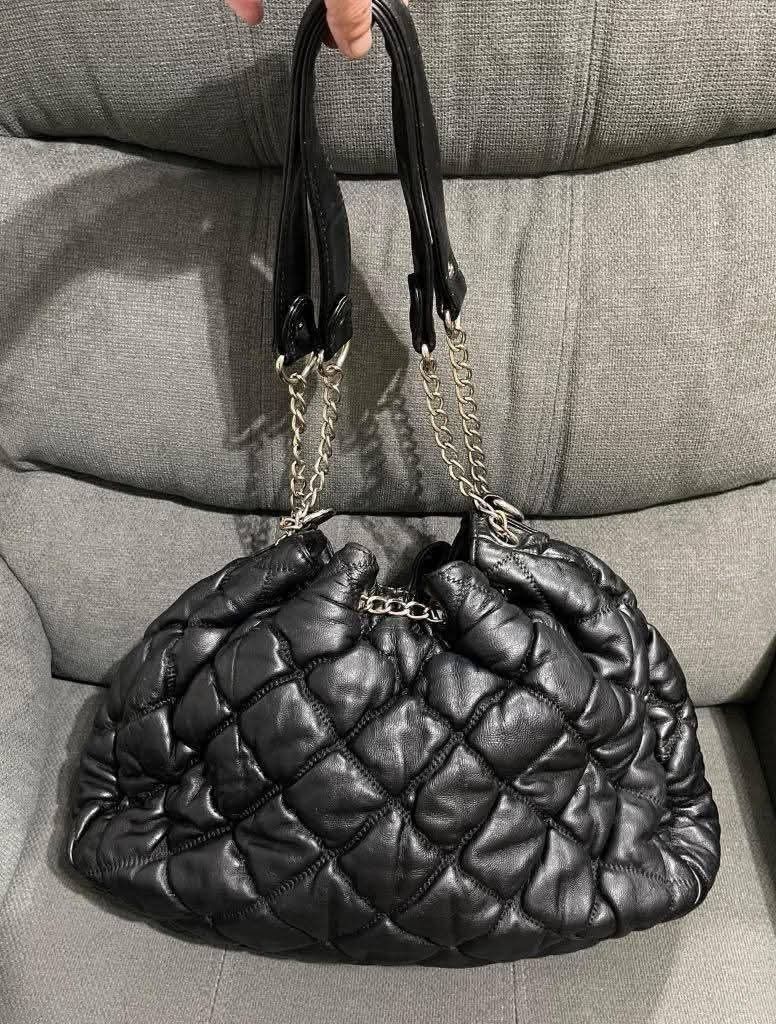 CC Quilted Bucket Bag (Category: Shoulder Bags) located in Quezon City. Submitted by luxxechic (Listing ID 1468573203, Image 2). Description: with holo sticker code pure leather looks new no issue japan preloved actual photo posted mop: gcash.