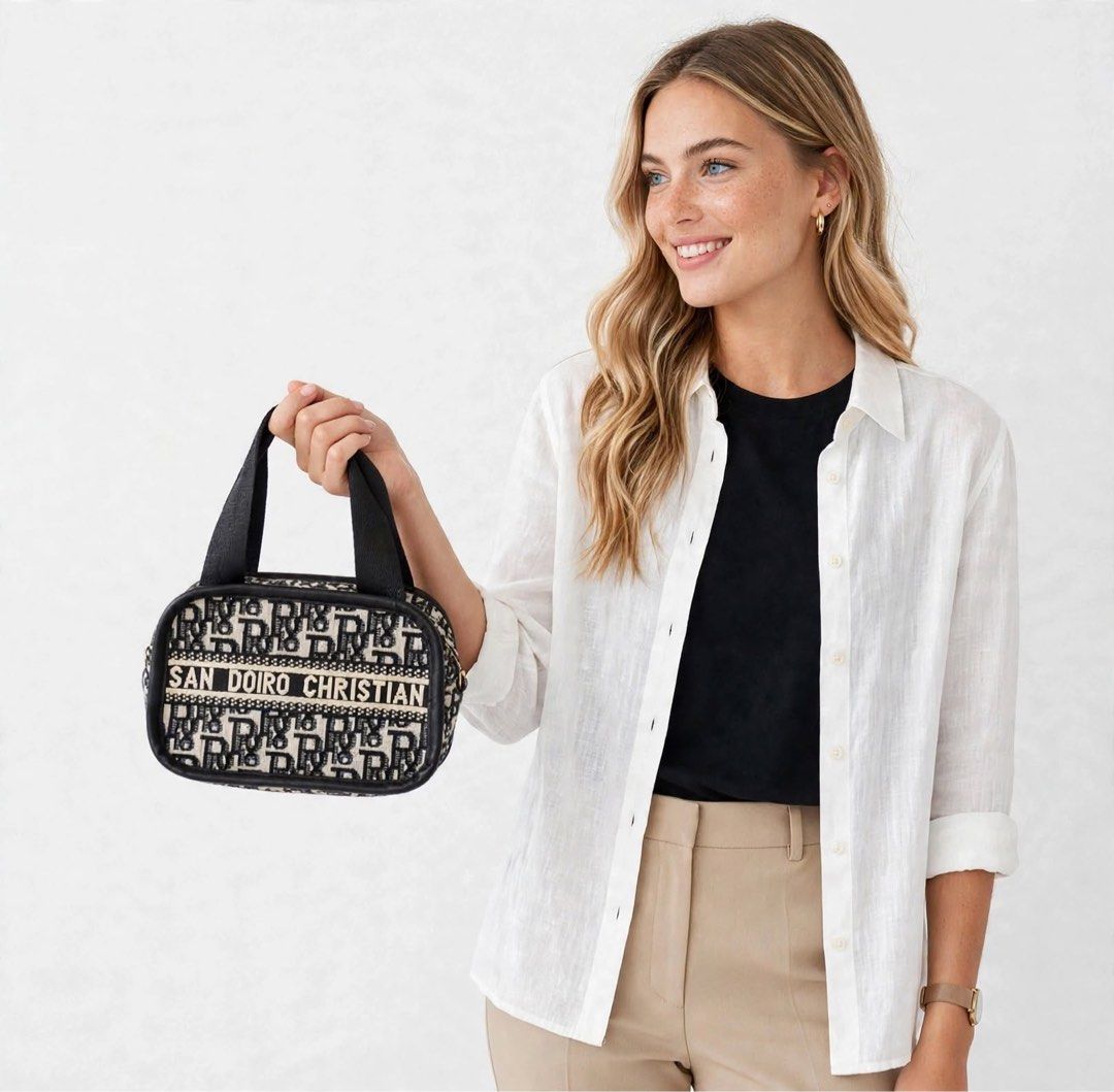 CD Black and Beige Monogram Vanity Bag OFF (Category: Purses & Pouches) located in San Pedro. Submitted by lifebeginsaftercoff33 (Listing ID 1468686924, Image 1). Description: - Color: Black and beige monogram with cream stripe and bold lettering - Shape: Structured boxy vanity bag with zip-around closure - Hardware: Silver-tone - Straps: Dual top handles - Interior: Fully lined, compact size for daily essentials - Condition: Excellent - Dimes: 7