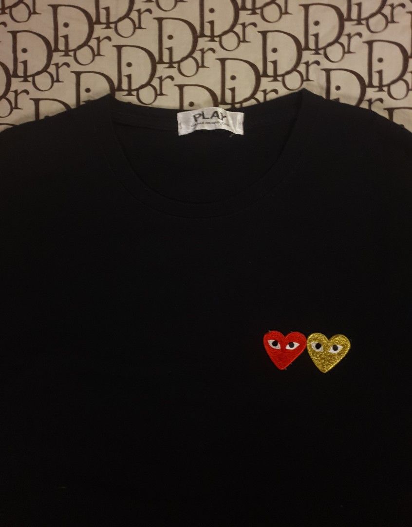 CDG PLAY 2 HEARTS COMME DES GARCONS (Category: Tshirts & Polo Shirts ) located in San Fernando. Submitted by retro.district. (Listing ID 1468712092, Image 2). Description: - Cdg play 2 hearts Comme des garcons - Size: XL - Condition: Excellent - issue: Missing washtag - Color Rate: 9.5/10.