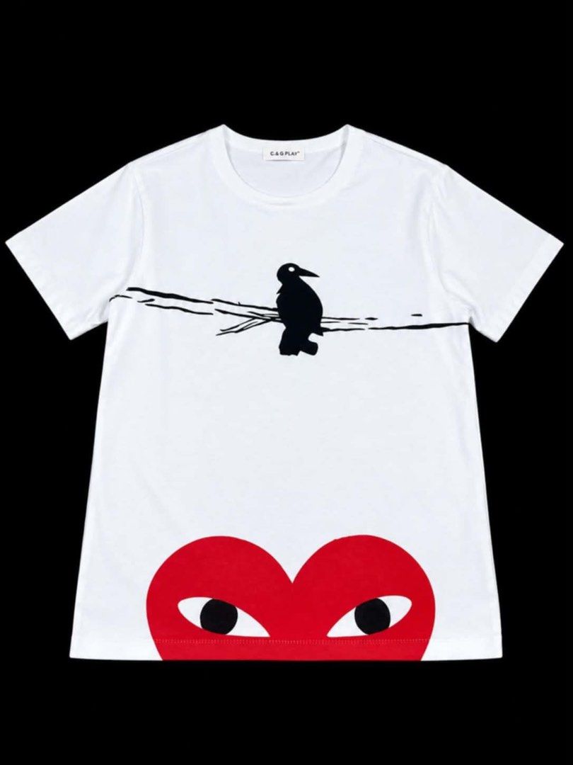 CDG Play Graphic T-shirt (Category: Shirts) located in Manila. Submitted by fastforest_65f95b (Listing ID 1468506232, Image 1). Description: - Brand: C.d.G. PLAY - Color: White - Material: 100% Cotton - Design: Bird graphic on branches with the signature red heart with eyes near the hem - Fit: Standard crew neck, short sleeve - Condition: Clean, excellent overall condition with intact graphics (no cracking).