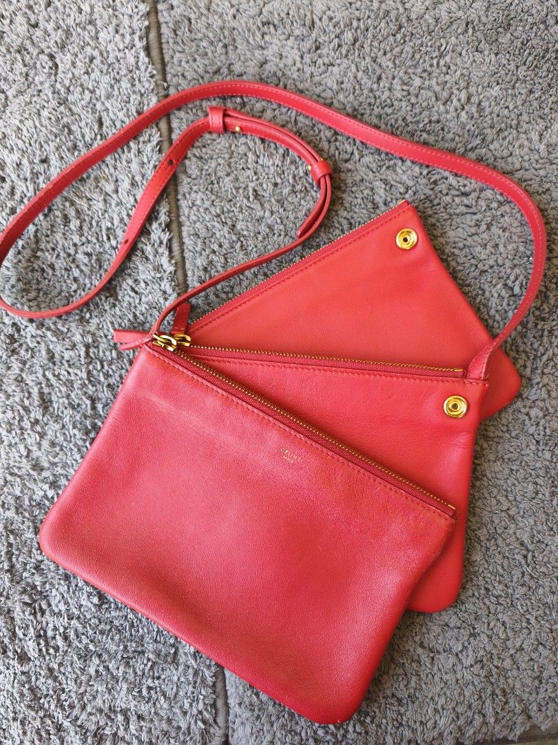 Celine Trio Red Sling Bag (Category: Luxury Bags & Wallets) located in Taytay. Submitted by rgun28 (Listing ID 1468564211, Image 2). Description: 🍀CELINE TRIO RED SLING BAG🍀 💯% guaranteed original 𝐂𝐨𝐧𝐝𝐢𝐭𝐢𝐨𝐧: In good used condition/ Rank A-AB. Normal signs of wear only no major flaws..See photos to appreciate.. Money back guaranteed if proven fake by Entrupy. As is where is..NO RETURN!! NO EXCHANGE!! 🔸Before purchasing, please refer t