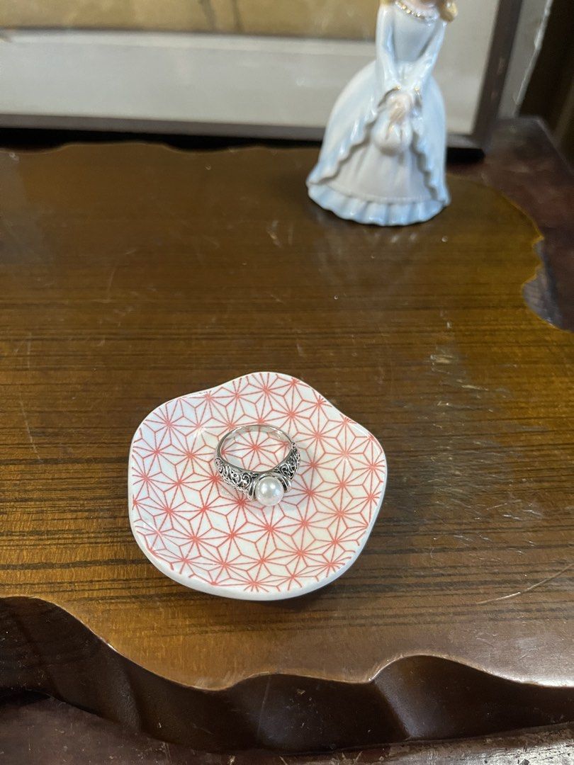 Ceramic ring dish pink geometric pattern (Category: Dinnerware & Cutlery) located in Taguig. Submitted by minmin_parker (Listing ID 1468537480, Image 2). Description: - Type: Small ceramic trinket dish - Design: Red geometric pattern on top with a clean white underside and base - Size: Approximately 2.5 inches across - Uses: Ideal for organizing rings, earrings, and other small accessories.