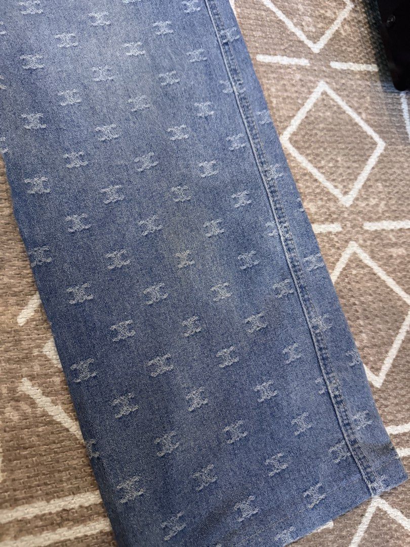 Challengers Crew Monogram Print Wide Leg Jeans (Category: Jeans) located in Bulacan. Submitted by zyannechlo86360 (Listing ID 1468550455, Image 3). Description: - Brand: Challengers Crew - Style: Light blue denim jeans with all-over monogram pattern, wide leg fit, and high waist - Closure: Unique multiple front button design with standard belt loops - Pockets: Two back pockets plus a branded rear waistband tag - Condition: Good pre-loved conditio