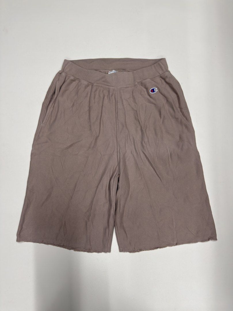 Champion Reverse Weave Dust Pink Sweat Shorts Size Large (Category: Shorts) located in Bustos. Submitted by thenlnclot60500 (Listing ID 1468602789, Image 1). Description: - Brand: Champion Reverse Weave - Style/Color: Dusty pink / mauve sweat shorts - Size: Large (tag inside waistband) - Material: Thick 100% cotton French terry (Style C3-T515) - Design: Classic embroidered C logo near left hip - Features: Adjustable drawstring waist with metal gr