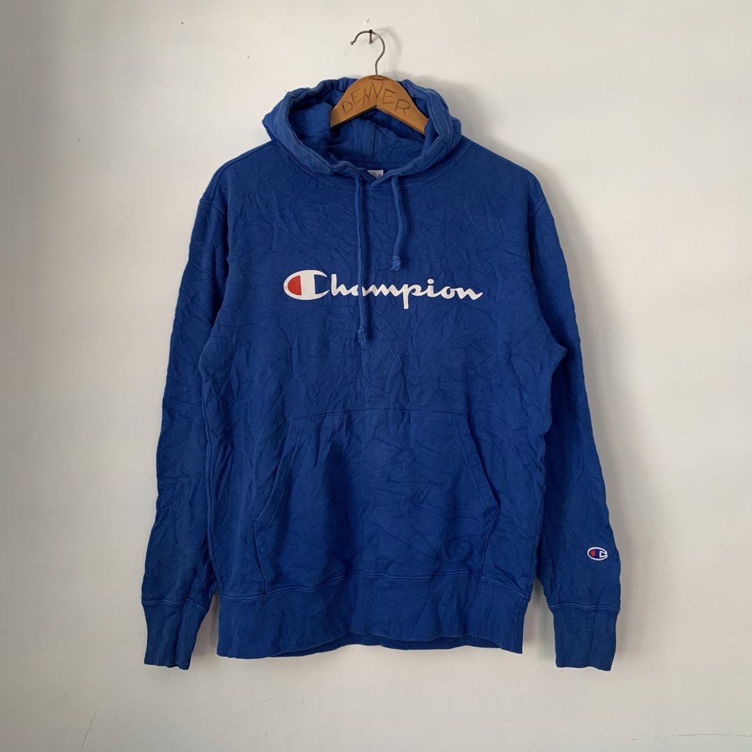 Champion Royal Blue Script Logo Hoodie X-Large (Category: Coats, Jackets and Outerwear) located in Manila. Submitted by gentleflower-74686a (Listing ID 1468502785, Image 1). Description: - Brand: Champion - 21.5 x 25 - Color: Royal Blue - Size: XL - Material: 100% Cotton - Design: Classic script logo on chest, small 'C' patch on left sleeve - Features: Kangaroo pocket, adjustable drawstring hood - Condition: Great casual piece for daily wear.