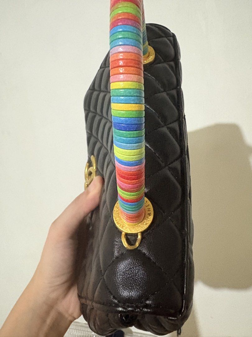 Chanel x Cambron OG cc underzip lambskin leather (Category: Luxury Bags & Wallets) located in Paranaque City. Submitted by GotUph (Listing ID 1468667853, Image 2). Description: - Brand: Chanel - Style: Quilted lambskin - Color: Classic black with pink interior lining - Handle: Coco handle bag super cool and unique multicolor stacked ring top handle - Strap: Included chain strap - Hardware: Gold-tone with iconic CC turn-lock closure - Interior: Zi