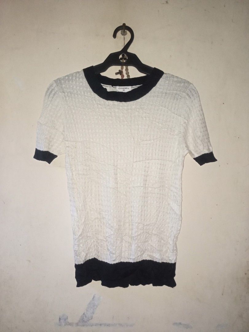 Chanel cable knit (Category: Shirts) located in Manila. Submitted by kenny200024 (Listing ID 1468651849, Image 1). Description: Chanel cable knit - xs to small - actual measurement width 14.5 | length 22.5 - excellent condition - need wash | fresh from bale.
