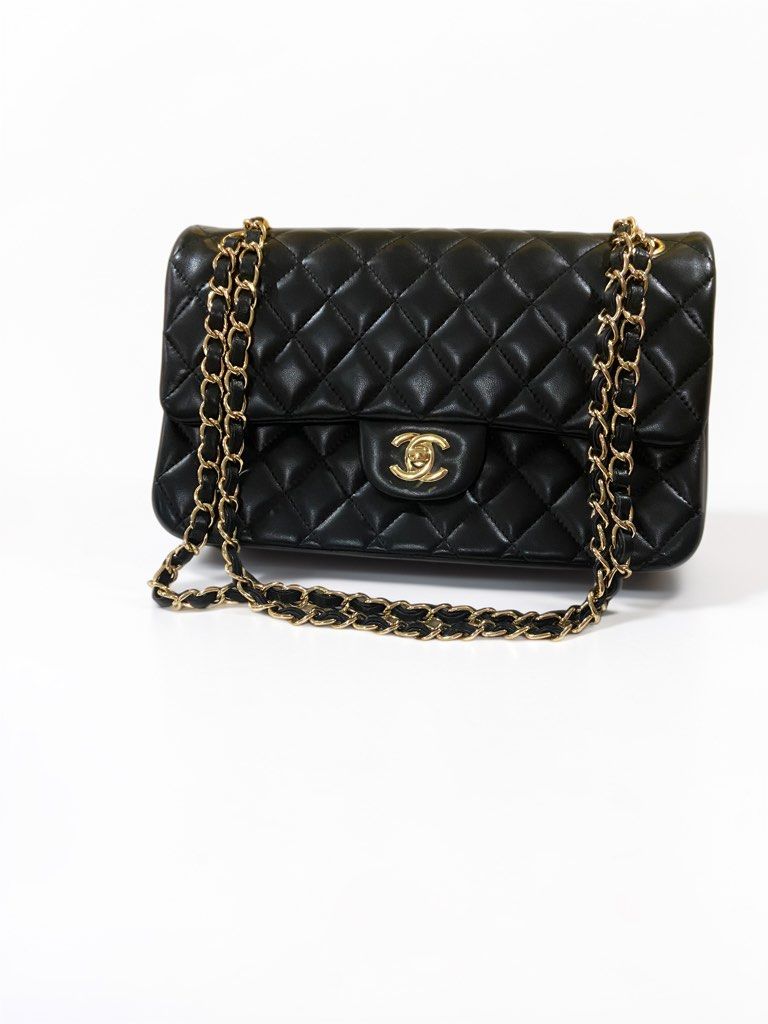 Chanel Classic Flap Bag Black Gold Hardware (Category: Luxury Bags & Wallets) located in Quezon City. Submitted by emjen (Listing ID 1468526836, Image 1). Description: - Chanel shoulder bag Lamb Skin - Black quilted leather with classic design - Iconic gold-tone interlocking CC turn-lock closure - Intertwined leather and chain strap - Secure flap closure style - Clean quilted pattern on front and back - Timeless luxury investment piece Within BUL