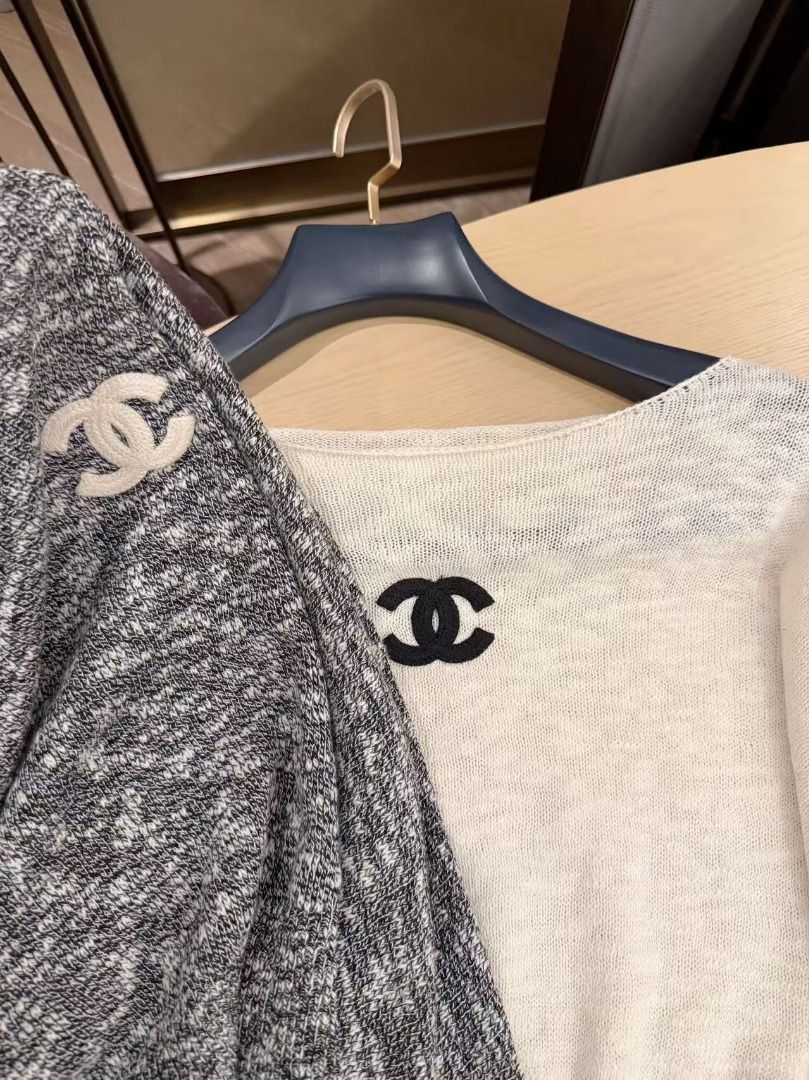 Chanel Knit Sweater Top with CC Logo (Category: Longsleeves) located in Quezon City. Submitted by vangjalaya37815 (Listing ID 1468583589, Image 2). Description: - Brand: Chanel - Style: Knit sweater top with embroidered CC logo, boat neck, long sleeves, and cropped fit - Material: Soft and lightweight knit - Colors available: Classic White and Heather Grey - Versatility: Easy to style with high-waisted jeans or skirts - Condition: Brand new / Exc