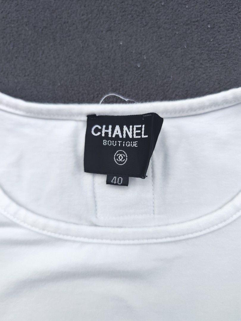 Chanel Womens Tee (Category: Shirts) located in Bulacan. Submitted by emilj23 (Listing ID 1468522305, Image 3). Description: Chanel Womens Tee Size 40 on tag L 22 W 14 Condition 9/10 Color rate 9/10 No Issue.