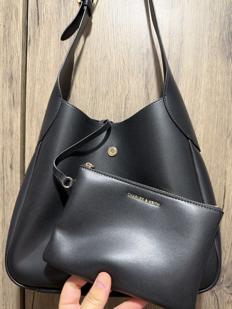 Charles & Keith Mini Adalyn Hobo Bag (Category: Shoulder Bags) located in Davao. Submitted by doc-riz (Listing ID 1468620798, Image 3). Description: ✨Charles & Keith Mini Adalyn Hobo Bag ✔️Rarely used ✔️With dust bag ✔️₱2500 from almost 4K Note: Don’t be fooled by the name “Mini”—it’s actually more of a medium-sized bag than a mini one. Out of stock na ito online & in stores 😊 🚛Grab/J&T 💸MOP: BDO/Metrobank/Gcash/Maya/Gotyme/Maribank ⚠️No meet 