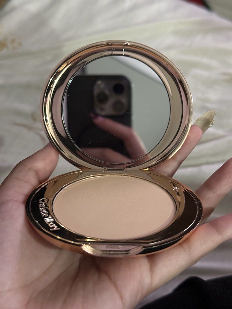 Charlotte Tilbury powder (Category: Makeup) located in Pateros City. Submitted by wieepaa_ (Listing ID 1468634966, Image 3). Description: - medium shade (not my shade pla) - used once lang:( - i still have the box! .