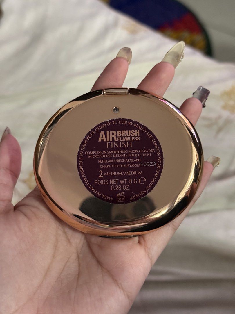 Charlotte Tilbury powder (Category: Makeup) located in Pateros City. Submitted by wieepaa_ (Listing ID 1468634966, Image 2). Description: - medium shade (not my shade pla) - used once lang:( - i still have the box! .