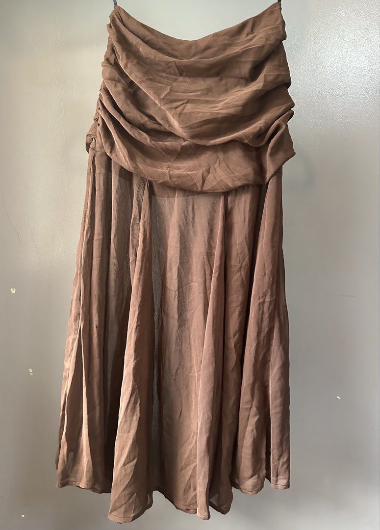 chocolate Semi-sheered draped skirt (Category: Skirts) located in Quezon City. Submitted by tan__k (Listing ID 1468505223, Image 2). Description: brandnew size XS no flaws no when worn by me.