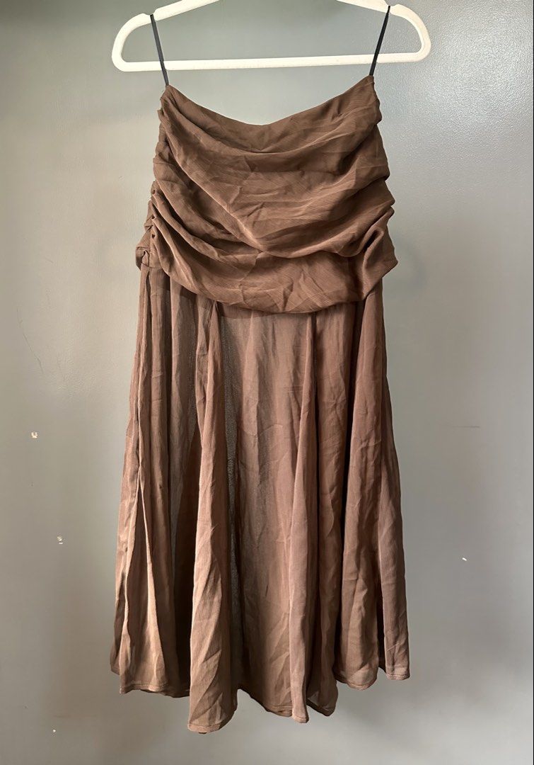 chocolate Semi-sheered draped skirt (Category: Skirts) located in Quezon City. Submitted by tan__k (Listing ID 1468505223, Image 1). Description: brandnew size XS no flaws no when worn by me.
