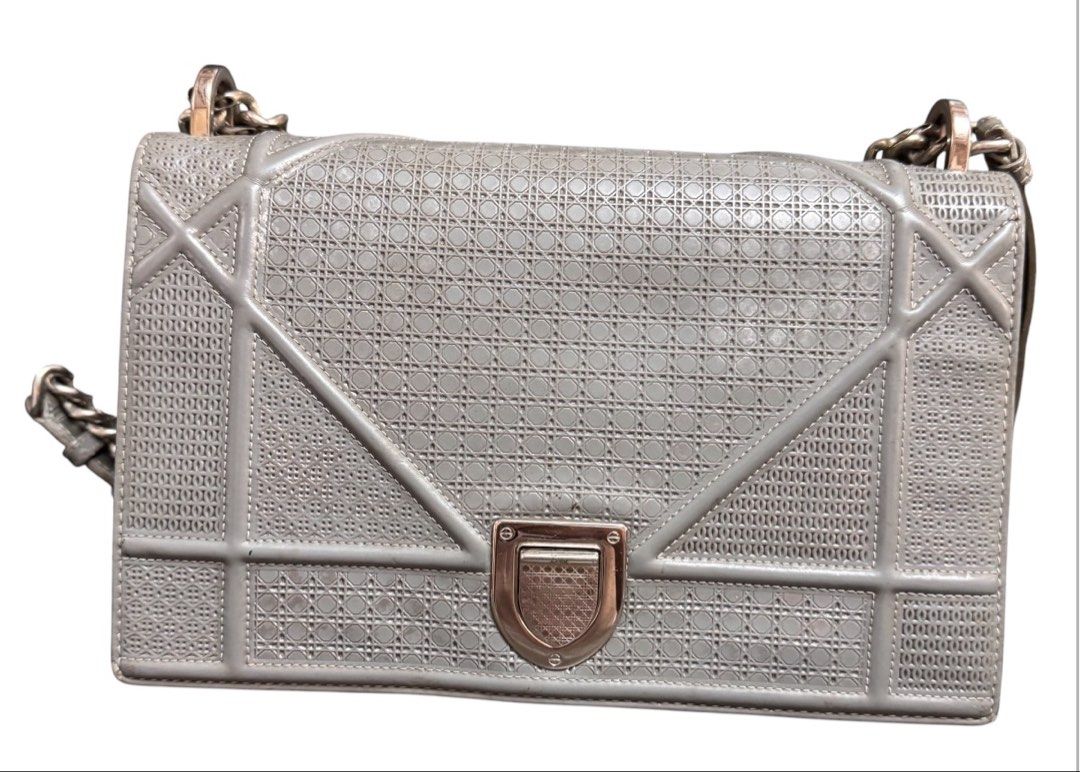 Christian Dior Diorama Shoulder Bag (Category: Shoulder Bags) located in Baguio. Submitted by pwz-eshop (Listing ID 1468566734, Image 1). Description: • Up for Grabs!! • Guaranteed Authentic!! • Flaws: Silver coating has been washed out. Cracks on handles. Tiny crack underneath flap. Rubs on corners. (please see photos) • BRAND: Christian Dior. • DIMENSIONS: length 9.75", height 6", width 2.5", handle drop: 20.5". • SERIAL NUMBER: 09-B0-1135. • C
