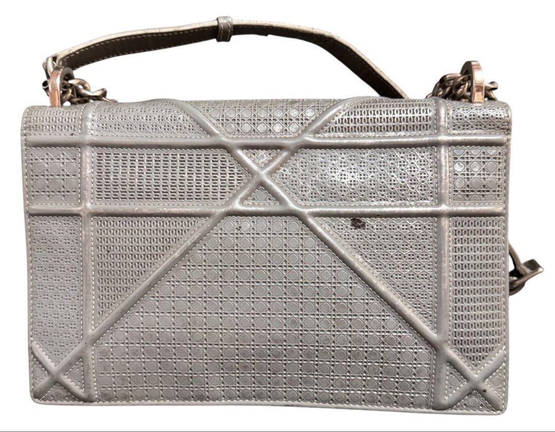Christian Dior Diorama Shoulder Bag (Category: Shoulder Bags) located in Baguio. Submitted by pwz-eshop (Listing ID 1468566734, Image 2). Description: • Up for Grabs!! • Guaranteed Authentic!! • Flaws: Silver coating has been washed out. Cracks on handles. Tiny crack underneath flap. Rubs on corners. (please see photos) • BRAND: Christian Dior. • DIMENSIONS: length 9.75", height 6", width 2.5", handle drop: 20.5". • SERIAL NUMBER: 09-B0-1135. • C