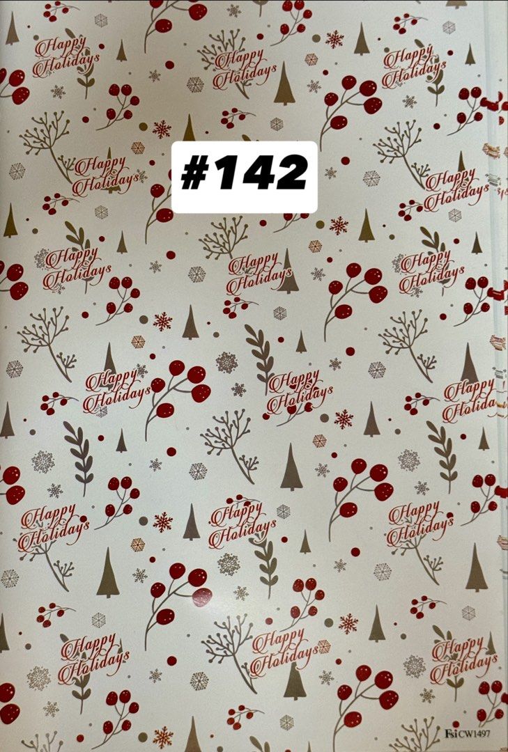 Christmas Holiday Wrapping Paper Assorted Designs (Category: Craft Supplies & Tools) located in Quezon City. Submitted by kryshnanzyanna (Listing ID 1468523023, Image 2). Description: - Brand new, unused Christmas wrapping paper - Features festive designs including trees, snowflakes, berries, and Merry Christmas text - Beautiful holiday color scheme: gold trees on white, classic red with script, and green trees - Ideal for holiday gift-giving and