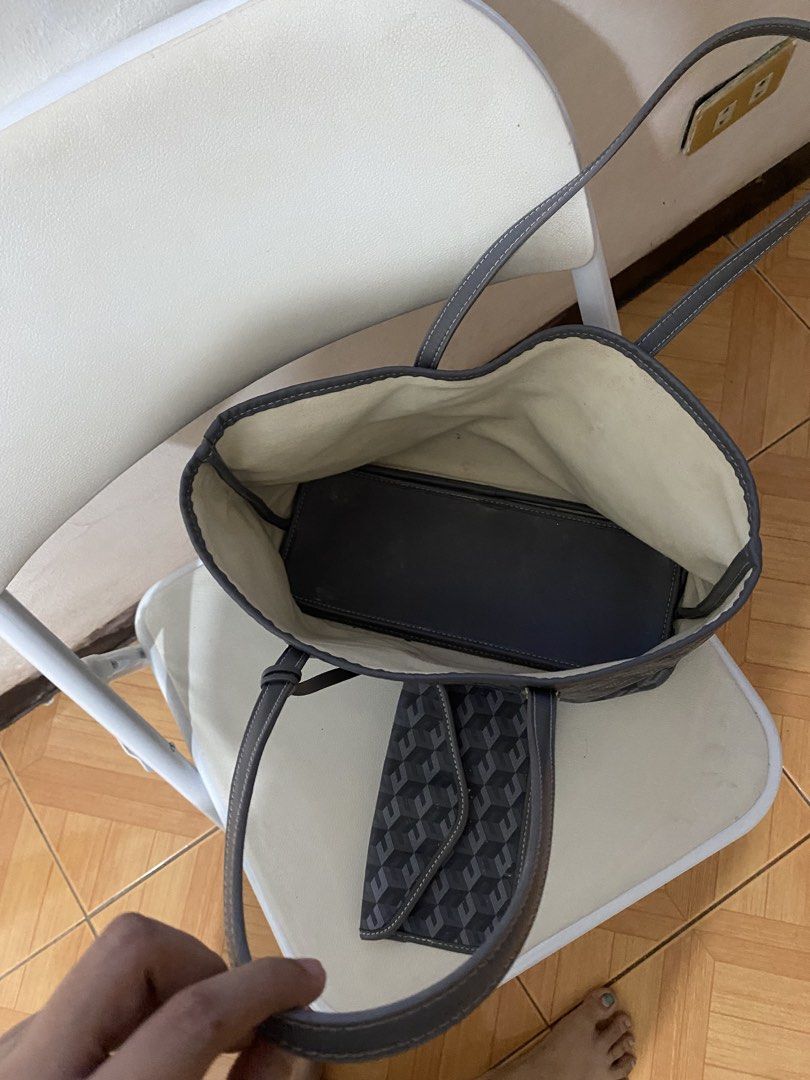 Christy ng grey tote bag (Category: Tote Bags) located in Pasig City. Submitted by avery4444 (Listing ID 1468708531, Image 2). Description: Good condition .