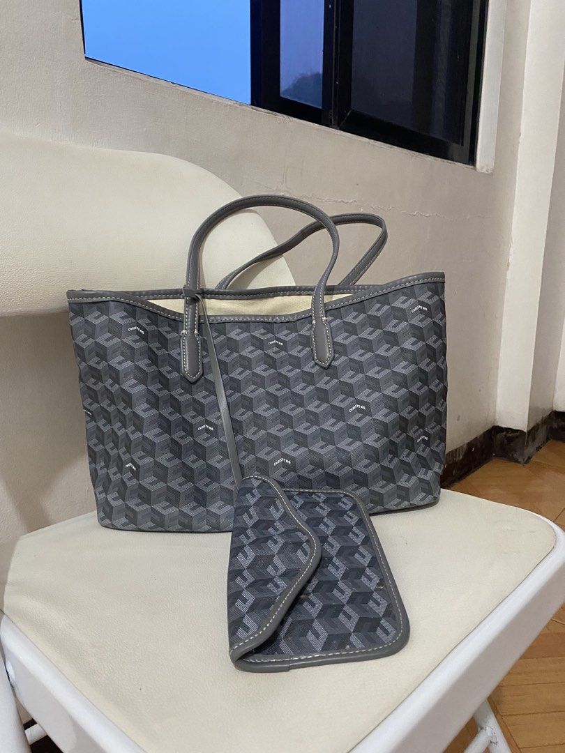 Christy ng grey tote bag (Category: Tote Bags) located in Pasig City. Submitted by avery4444 (Listing ID 1468708531, Image 1). Description: Good condition .