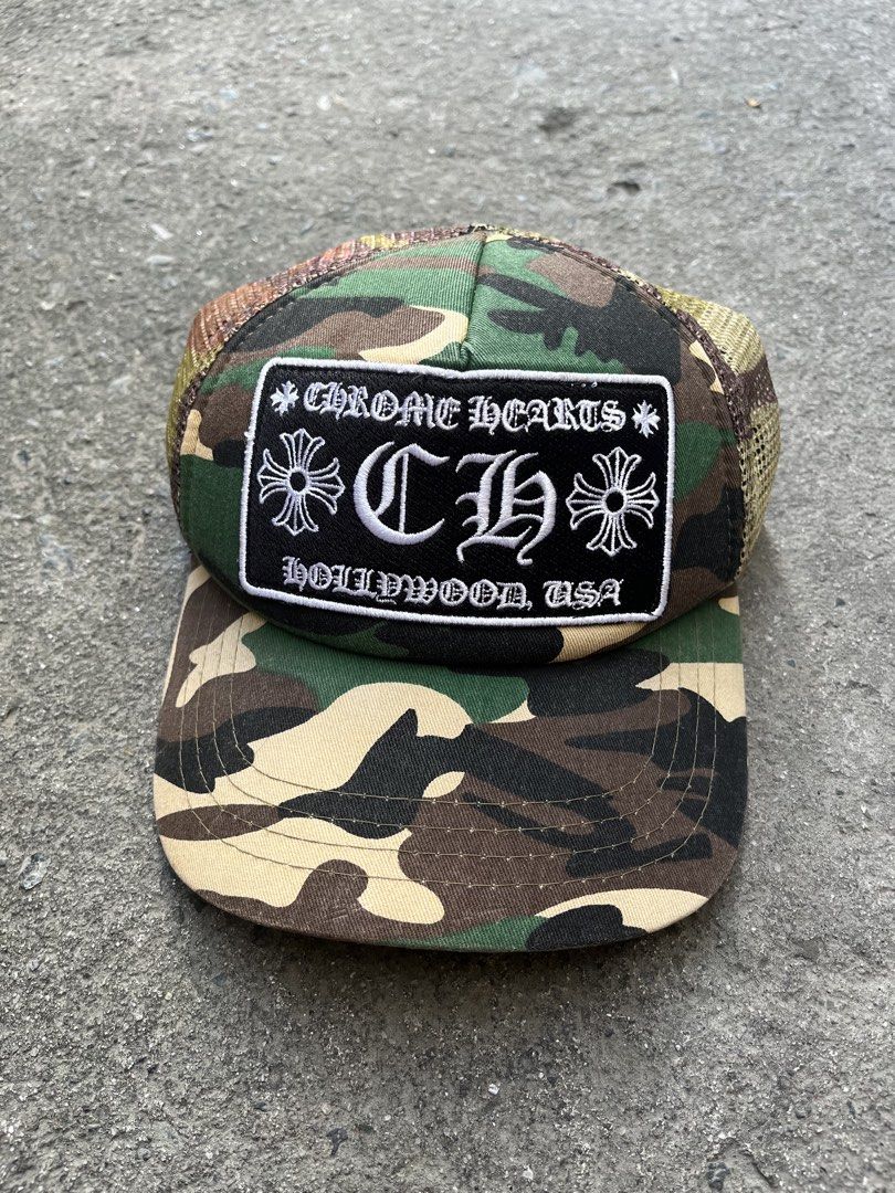 CHROME HEARTS CAP (Category: Caps & Hats) located in Las Pinas. Submitted by adthrift808 (Listing ID 1468549453, Image 3). Description: CHROME HEARTS CAMOUFLAGE TRUCKER CAP Good condition Color rate: 9/10 Complete tags Issue: Missing top button DM ME FOR OTHER DETAILS!📥📥📥.