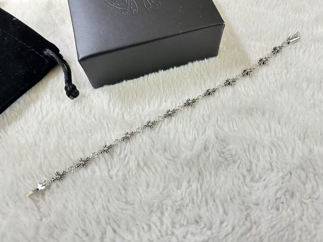 Chrome Hearts Tiny Cross Bracelet (Category: Bracelets) located in Quezon City. Submitted by grossoimor01025 (Listing ID 1468587099, Image 3). Description: - Material/Style: Classic gothic silver bracelet with delicate cross charms all around - Closure: Secure box clasp for worry-free wear - Inclusions: Comes complete with a branded black presentation box and velvet pouch - Condition: Stored carefully inside its box when not worn, excellent every